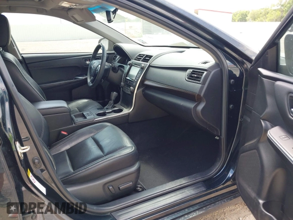 2015 Toyota Camry XLE with VIN 4T1BF1FKXFU881017, listed as a IAAI auction lot 42054825 with 122,232 mi miles and . Bid and sale history available at DreamBid. Image 5.