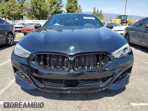 2022 BMW 8 Series M850i with VIN WBAGV8C02NCK08667, listed as a Copart auction lot 50335155 with 22,737 mi miles and Salvage title. Bid and sale history available at DreamBid. Image 5.