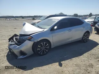 2019 Toyota Corolla L with VIN 2T1BURHE4KC213737, listed as a Copart auction lot 56304215 with 158,330 mi miles and Salvage title. Bid and sale history available at DreamBid. Image 1.