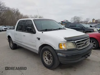 2001 Ford F-150 SuperCrew XLT with VIN 1FTRW07L61KB49220, listed as a IAAI auction lot 41826223 with 281,547 mi miles. Bid and sale history available at carsss.com. Image 1.