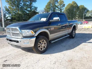2016 Ram 2500 Laramie with VIN 3C6UR5FL3GG124072, listed as a IAAI auction lot 41305989 with 151,283 mi miles. Bid and sale history available at carsss.com. Image 2.