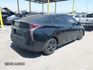 2017 Toyota Prius Two with VIN JTDKBRFU1H3036243, listed as a IAAI auction lot 41991623 with 88,626 mi miles. Bid and sale history available at carsss.com. Image 4.