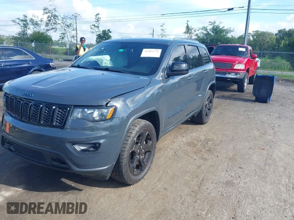 2018 Jeep Grand Cherokee Altitude with VIN 1C4RJFAG7JC394051, listed as a IAAI auction lot 42492771 with 147,669 mi miles and . Bid and sale history available at DreamBid. Image 17.