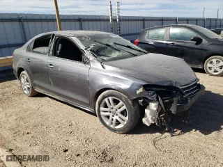 2015 Volkswagen Jetta Sedan 2.0L S with VIN 3VW2K7AJ0FM247413, listed as a Copart auction lot 70717134 with 156,947 mi miles and Clean Title. Bid and sale history available at carsss.com. Image 4.