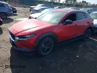 2022 Mazda CX-30 2.5 Turbo Premium Package with VIN 3MVDMBDY1NM458943, listed as a IAAI auction lot 41513141 with 16,858 mi miles. Bid and sale history available at carsss.com. Image 2.