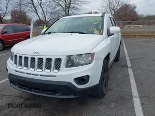 2016 Jeep Compass Latitude with VIN 1C4NJCEA3GD735161, listed as a IAAI auction lot 40881008 with 126,384 mi miles. Bid and sale history available at carsss.com. Image 2.
