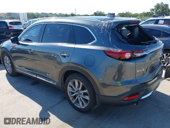 2020 Mazda CX-9 Grand Touring with VIN JM3TCADY1L0417651, listed as a IAAI auction lot 42334867 with 105,236 mi miles and . Bid and sale history available at DreamBid. Image 3.