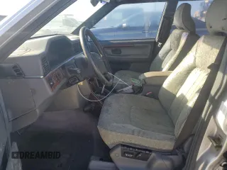 1997 Volvo 960 z VIN YV1KW960XV1043372, wystawiony jako Copart lot #74294964 z przebiegiem 94 877 mil mil oraz Szkody całkowita. Historia ofert i sprzedaży dostępna na DreamBid. Obrazek 7.