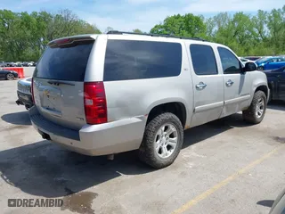 2007 Chevrolet Suburban LT with VIN 3GNFK16367G246091, listed as a IAAI auction lot 42105259 with 216,014 mi miles. Bid and sale history available at carsss.com. Image 4.