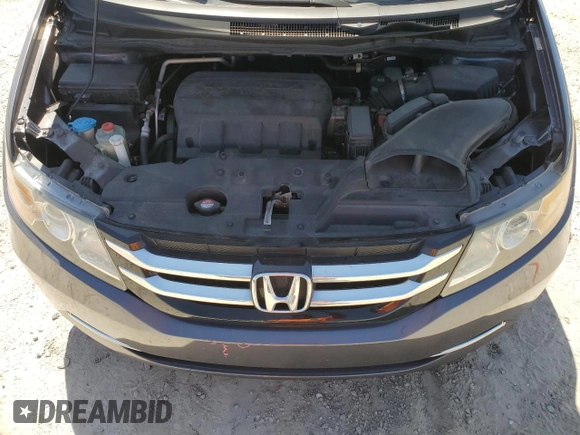 2016 Honda Odyssey EX-L with VIN 5FNRL5H6XGB100929, listed as a Copart auction lot 48889205 with 148,766 mi miles and Salvage Title. Bid and sale history available at DreamBid. Image 12.