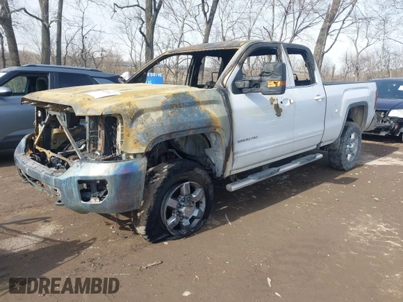 2016 GMC Sierra 2500HD SLE z VIN 1GT22SEG5GZ232894, wystawiony jako IAAI lot #41593141 z przebiegiem 159 000 mil mil oraz . Historia ofert i sprzedaży dostępna na DreamBid. Obrazek 2.