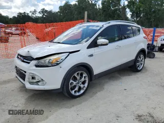 2015 Ford Escape Titanium with VIN 1FMCU0J93FUB00167, listed as a Copart auction lot 60531745 with 157,041 mi miles and Salvage title. Bid and sale history available at DreamBid. Image 1.