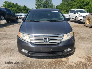 2012 Honda Odyssey Touring with VIN 5FNRL5H90CB505590, listed as a Copart auction lot 62566715 with 323,092 mi miles and Clean title. Bid and sale history available at DreamBid. Image 5.