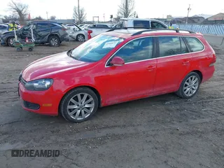 2012 Volkswagen Jetta SportWagen TDI with VIN 3VWPL7AJ0CM684682, listed as a IAAI auction lot 41680632 with 124,721 mi miles. Bid and sale history available at carsss.com. Image 2.