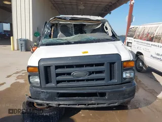 2014 Ford Econoline Wagon XL with VIN 1FBSS3BLXEDA71562, listed as a IAAI auction lot 41864794 with 140,942 mi miles. Bid and sale history available at carsss.com. Image 12.