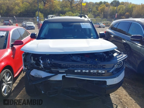 2023 Ford Bronco Sport Badlands z VIN 3FMCR9D93PRD33699, wystawiony jako IAAI lot #40632148 z przebiegiem 21 363 mil mil oraz . Historia ofert i sprzedaży dostępna na DreamBid. Obrazek 12.