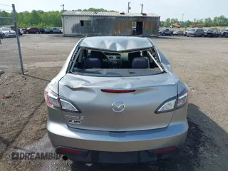 2011 Mazda Mazda3 i Touring with VIN JM1BL1VGXB1372499, listed as a IAAI auction lot 42112283 with 98,564 mi miles. Bid and sale history available at carsss.com. Image 17.
