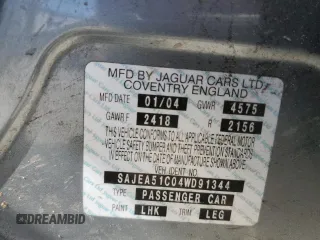 2004 Jaguar X-Type with VIN SAJEA51C04WD91344, listed as a Copart auction lot 49979285 with Not Provided miles and Salvage Title. Bid and sale history available at DreamBid. Image 12.