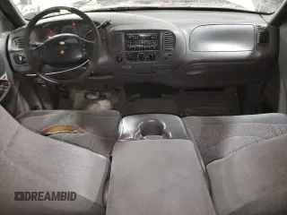 1999 Ford F-150 XL с VIN 1FTRX18LXXKA69025, выставлен на аукционе Copart как лот 57625035 с пробегом Не указан миль и На запчасти • Non repairable. История ставок и продаж доступна на DreamBid. Изображение 8.