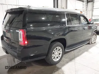 2018 GMC Yukon XL SLT with VIN 1GKS2GKC5JR346324, listed as a IAAI auction lot 41580164 with 123,640 mi miles. Bid and sale history available at carsss.com. Image 4.