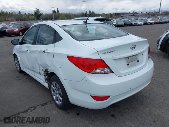 2013 Hyundai Accent GLS with VIN KMHCT4AE6DU291877, listed as a IAAI auction lot 41931876 with 136,781 mi miles. Bid and sale history available at carsss.com. Image 3.