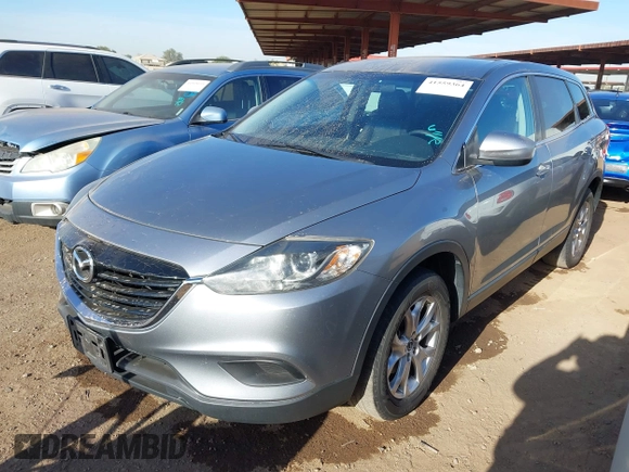 2015 Mazda CX-9 Touring with VIN JM3TB3CA7F0451472, listed as a IAAI auction lot 41559364 with 126,797 mi miles. Bid and sale history available at carsss.com. Image 2.