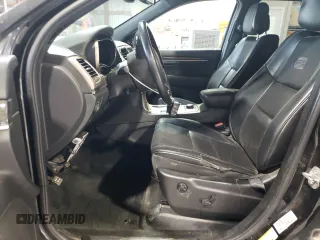 2015 Jeep Grand Cherokee Overland with VIN 1C4RJFCG0FC783375, listed as a Copart auction lot 61966725 with 191,478 mi miles and Salvage title. Bid and sale history available at DreamBid. Image 7.