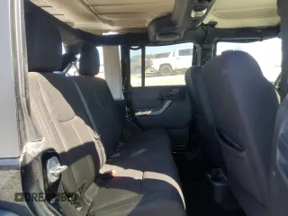2014 Jeep Wrangler Unlimited Sport with VIN 1C4BJWDG9EL250326, listed as a Copart auction lot 48545705 with 247,460 mi miles and Salvage Title. Bid and sale history available at DreamBid. Image 12.