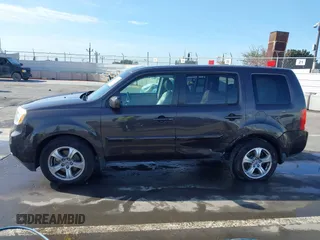 2013 Honda Pilot EX-L with VIN 5FNYF3H57DB031983, listed as a IAAI auction lot 41912221 with 148,908 mi miles. Bid and sale history available at carsss.com. Image 14.