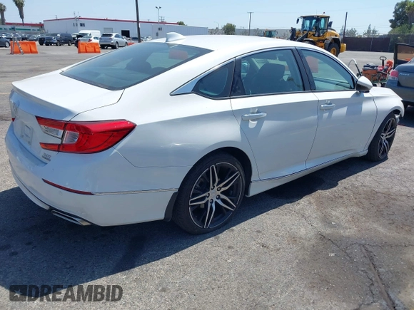 2021 Honda Accord Touring with VIN 1HGCV2F92MA024124, listed as a IAAI auction lot 42353443 with 22,457 mi miles and . Bid and sale history available at DreamBid. Image 4.