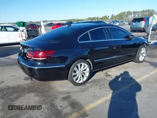 2013 Volkswagen CC VR6 Lux with VIN WVWHU7AN8DE509059, listed as a IAAI auction lot 41402695 with 123,518 mi miles. Bid and sale history available at carsss.com. Image 4.