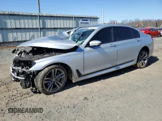 2018 BMW 7 Series 740i xDrive with VIN WBA7E4C56JGV28128, listed as a Copart auction lot 48404125 with Not provided miles and Salvage title. Bid and sale history available at DreamBid. Image 1.