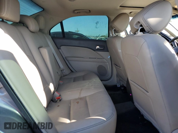 2012 Ford Fusion SEL z VIN 3FAHP0JA0CR398150, wystawiony jako Copart lot #57864455 z przebiegiem 166 046 mil mil oraz Szkoda całkowita • Salvage title. Historia ofert i sprzedaży dostępna na DreamBid. Obrazek 10.