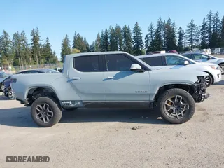 2022 Rivian R1T Adventure Package with VIN 7FCTGAAA5NN007018, listed as a IAAI auction lot 42018939 with 41,991 mi miles. Bid and sale history available at carsss.com. Image 14.
