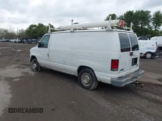 2002 Ford Econoline Cargo with VIN 1FTNE24L02HB73531, listed as a IAAI auction lot 41676620 with 125,683 mi miles and . Bid and sale history available at DreamBid. Image 3.