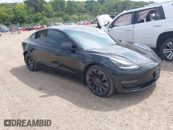 2021 Tesla Model 3 Performance with VIN 5YJ3E1EC5MF919278, listed as a IAAI auction lot 40194677 with 50,484 mi miles and . Bid and sale history available at carsss.com. Image 1.