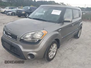 2013 Kia Soul with VIN KNDJT2A52D7549388, listed as a IAAI auction lot 40886665 with 164,543 mi miles. Bid and sale history available at carsss.com. Image 2.