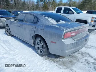 2014 Dodge Charger SXT with VIN 2C3CDXJG2EH135638, listed as a IAAI auction lot 41557427 with 83,536 mi miles. Bid and sale history available at carsss.com. Image 3.
