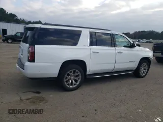 2019 GMC Yukon XL SLT with VIN 1GKS1GKC3KR189963, listed as a Copart auction lot 42402255 with 77,749 mi miles and Salvage Title. Bid and sale history available at carsss.com. Image 3.