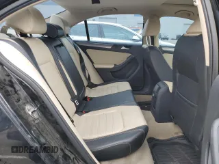 2014 Volkswagen Jetta SEL z VIN 3VWL17AJ8EM440253, wystawiony jako Copart lot #55537115 z przebiegiem 143 980 mil mil oraz Czysty tytuł • Clean title. Historia ofert i sprzedaży dostępna na DreamBid. Obrazek 10.