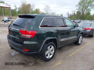 2011 Jeep Grand Cherokee 70th Anniversary with VIN 1J4RR4GG3BC631831, listed as a IAAI auction lot 42038415 with 130,811 mi miles. Bid and sale history available at carsss.com. Image 4.