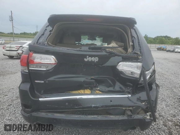 2015 Jeep Grand Cherokee Overland с VIN 1C4RJECG9FC620315, выставлен на аукционе Copart как лот 54569845 с пробегом 219 905 миль миль и Списание • Salvage title. История ставок и продаж доступна на DreamBid. Изображение 6.