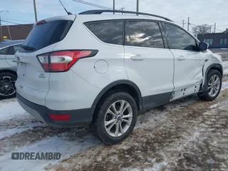 2018 Ford Escape SE with VIN 1FMCU0GD1JUC48757, listed as a IAAI auction lot 41631583 with 80,700 mi miles. Bid and sale history available at carsss.com. Image 4.