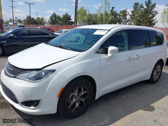 2019 Chrysler Pacifica Touring Plus with VIN 2C4RC1FG0KR629050, listed as a IAAI auction lot 41949260 with 143,879 mi miles. Bid and sale history available at carsss.com. Image 2.