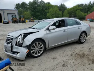 2015 Cadillac XTS Luxury z VIN 2G61M5S3XF9165634, wystawiony jako Copart lot #58325915 z przebiegiem 81 720 mil mil oraz Tytuł czysty. Historia ofert i sprzedaży dostępna na DreamBid. Obrazek 1.