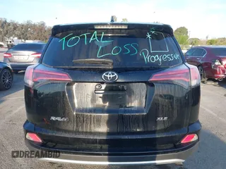 2018 Toyota RAV4 XLE with VIN 2T3WFREV2JW483635, listed as a IAAI auction lot 41856177 with 94,710 mi miles. Bid and sale history available at carsss.com. Image 17.