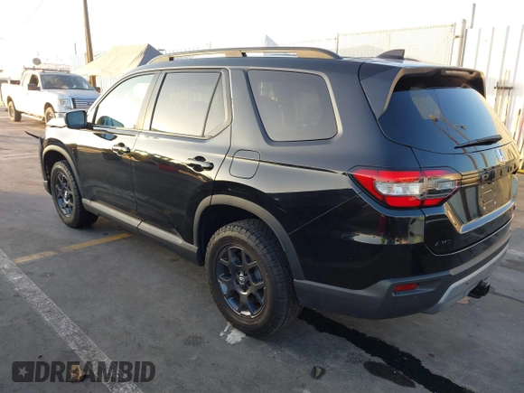 2023 Honda Pilot TrailSport with VIN 5FNYG1H60PB023366, listed as a IAAI auction lot 41040848 with 16,051 mi miles. Bid and sale history available at carsss.com. Image 3.