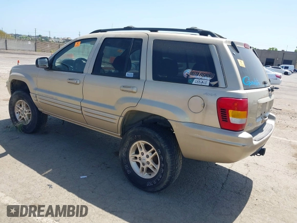 1999 Jeep Grand Cherokee Limited with VIN 1J4GW68N2XC654713, listed as a IAAI auction lot 42115829 with 195,988 mi miles. Bid and sale history available at carsss.com. Image 3.
