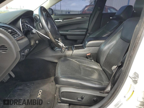 2015 Chrysler 300 C with VIN 2C3CCAET3FH739529, listed as a Copart auction lot 47520495 with 151,096 mi miles and Salvage Title. Bid and sale history available at DreamBid. Image 7.