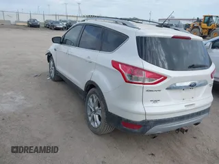 2015 Ford Escape Titanium with VIN 1FMCU9J90FUA67262, listed as a IAAI auction lot 41869583 with 161,281 mi miles. Bid and sale history available at carsss.com. Image 3.